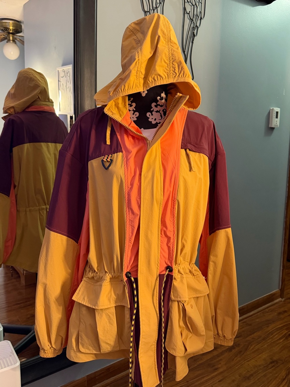 Fabletics Colorblock Hooded Utility Jacket in Yellow & Maroon & Orange